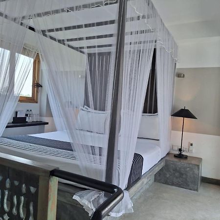 Отель Temptation Хиккадува Экстерьер фото